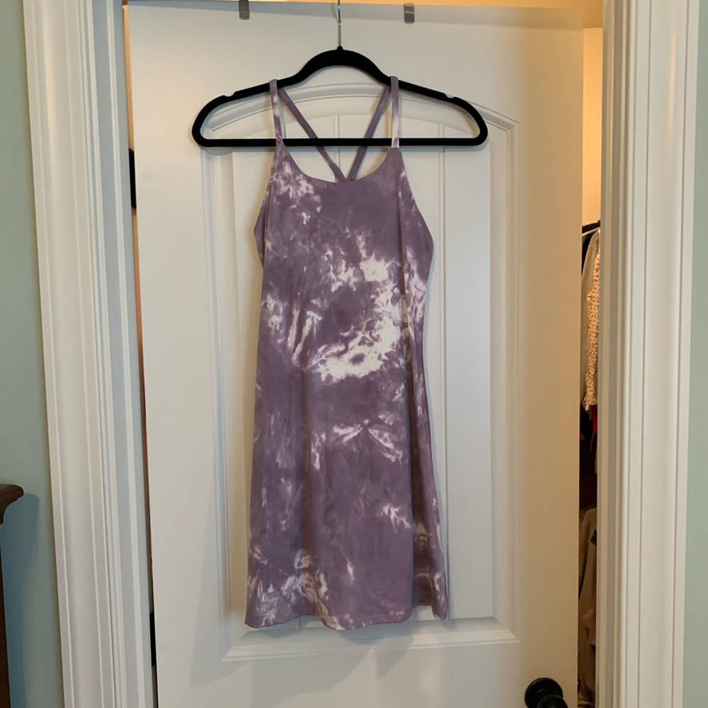 Athletic dress with built in bra and shorts with pockets.